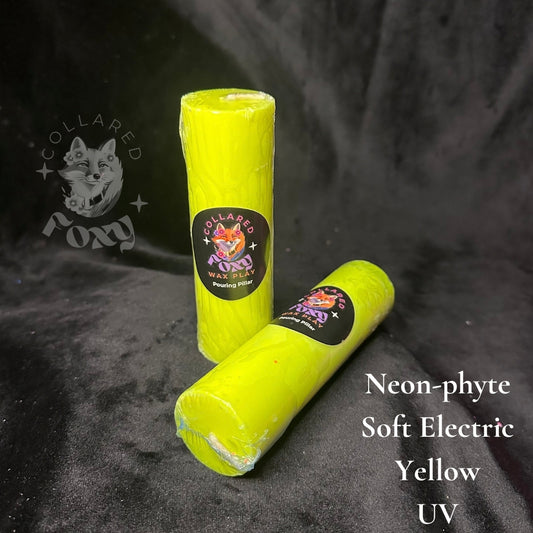 Soft Electric yellow Neon-phyte pouring pillar candles on black velvet with Neon-phyte label