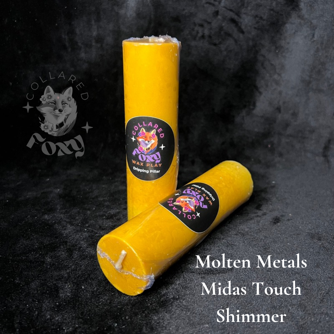 Midas Touch gold shimmer wax play candles, labelled, on black velvet