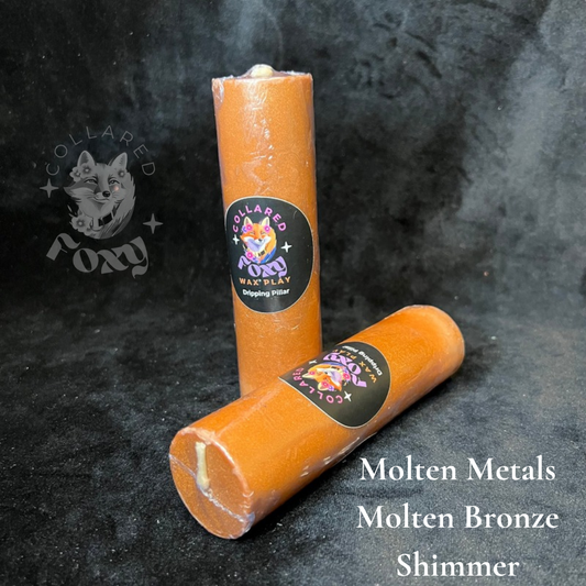 Molten Bronze shimmer wax play candles, labelled, on black velvet